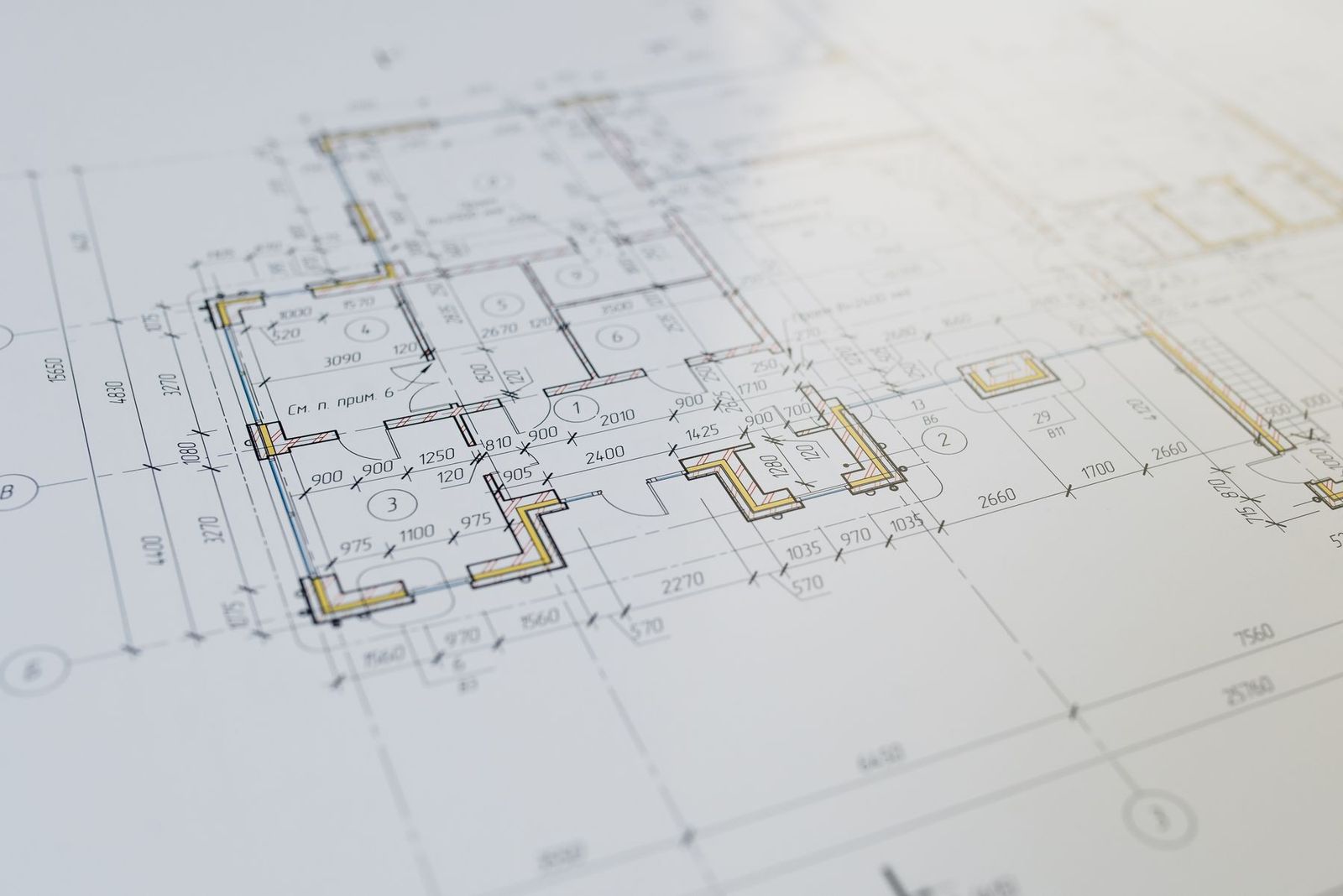 Architectural floor plan with dimensions on a drawing sheet